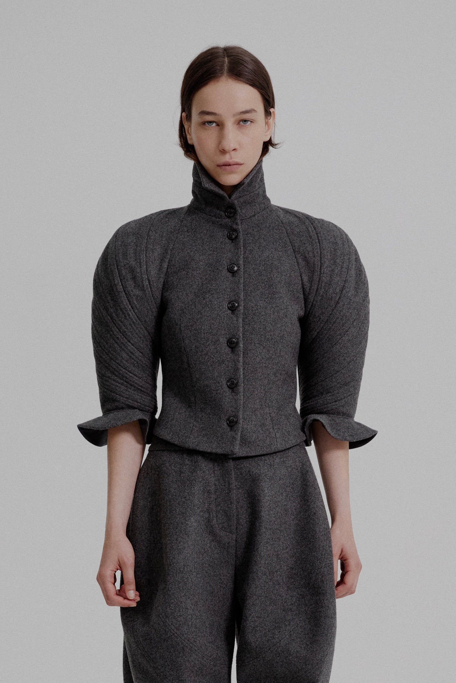 Kinetic sculpted sleeve bloomer jacket