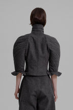 Kinetic sculpted sleeve bloomer jacket