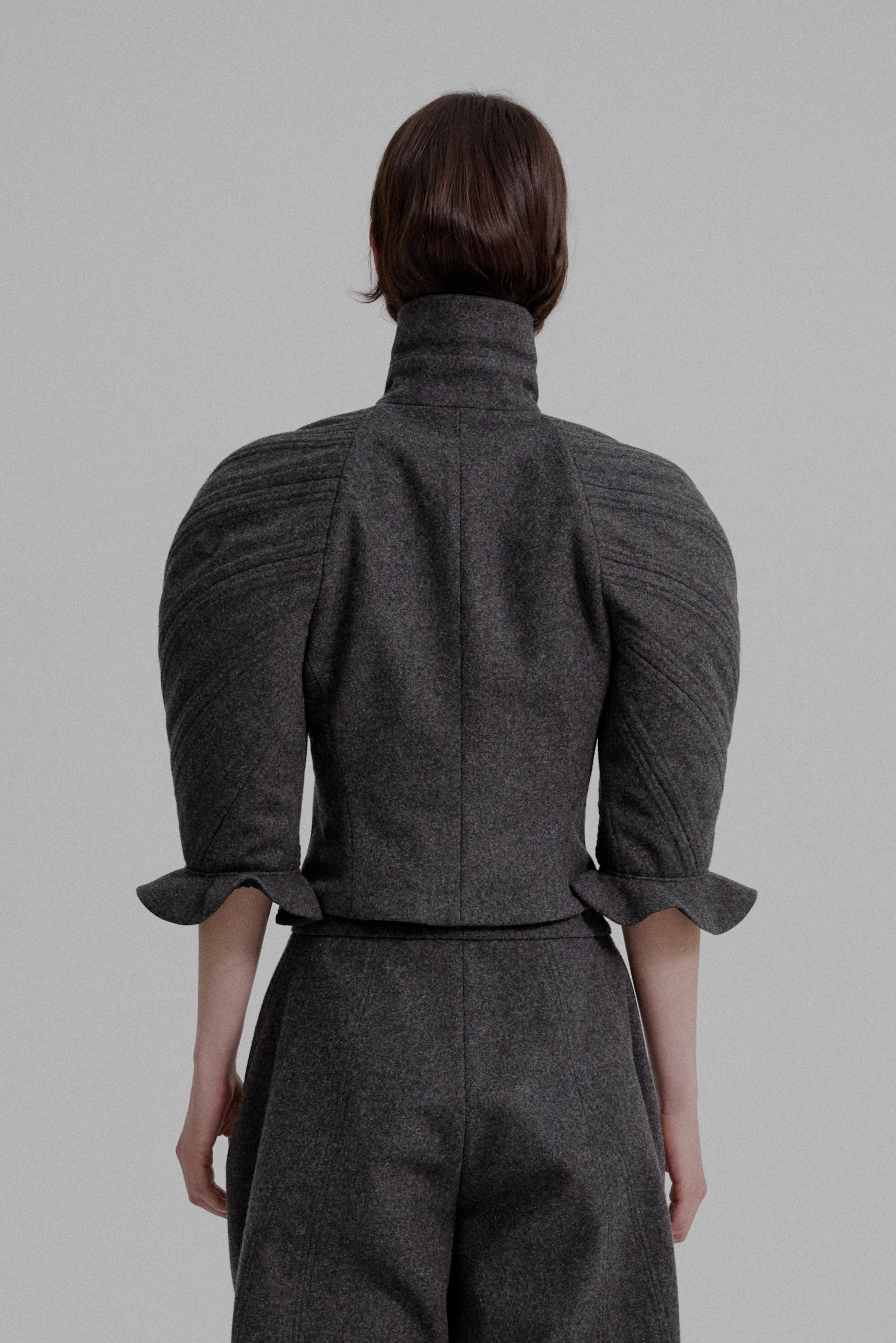 Kinetic sculpted sleeve bloomer jacket