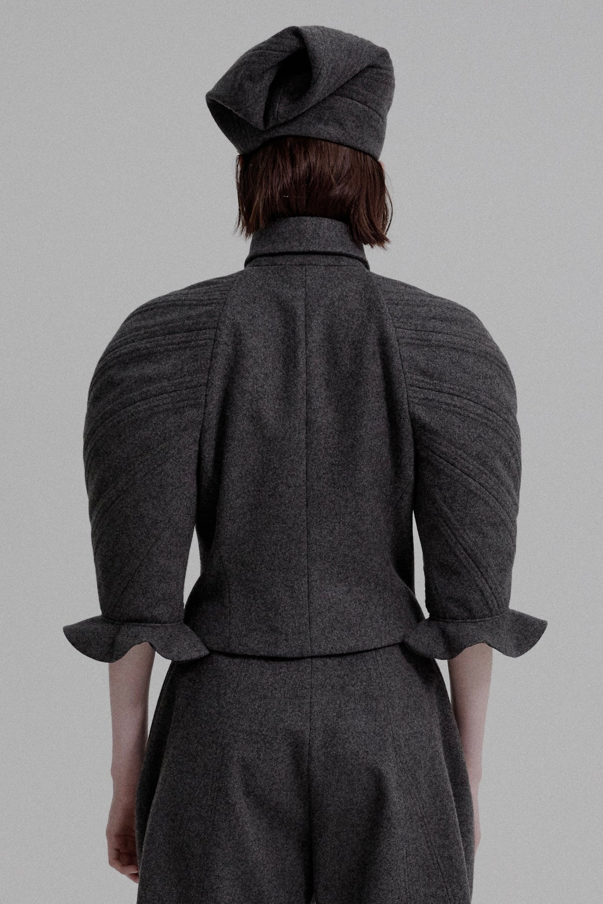 Kinetic sculpted sleeve bloomer jacket