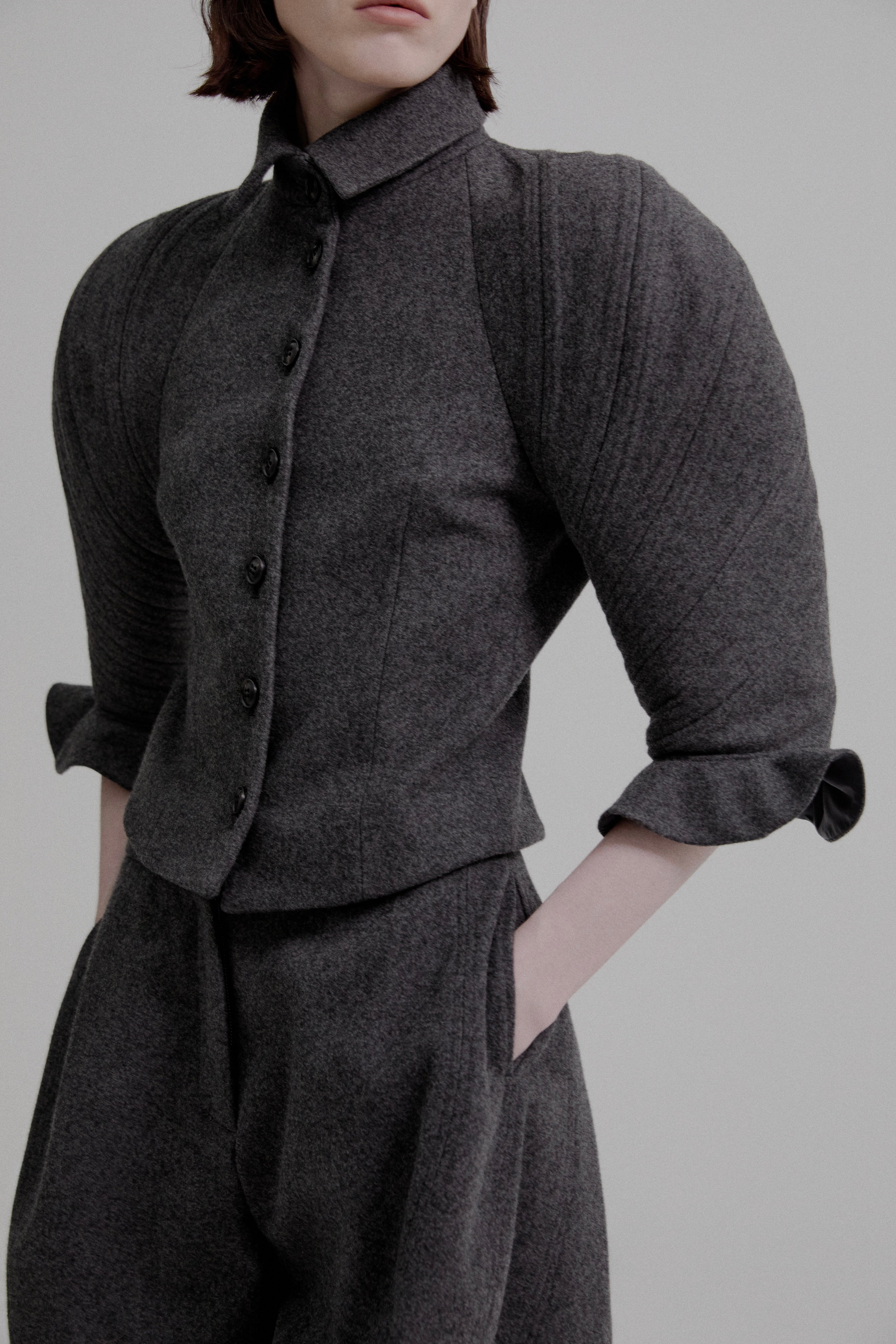 Kinetic sculpted sleeve bloomer jacket